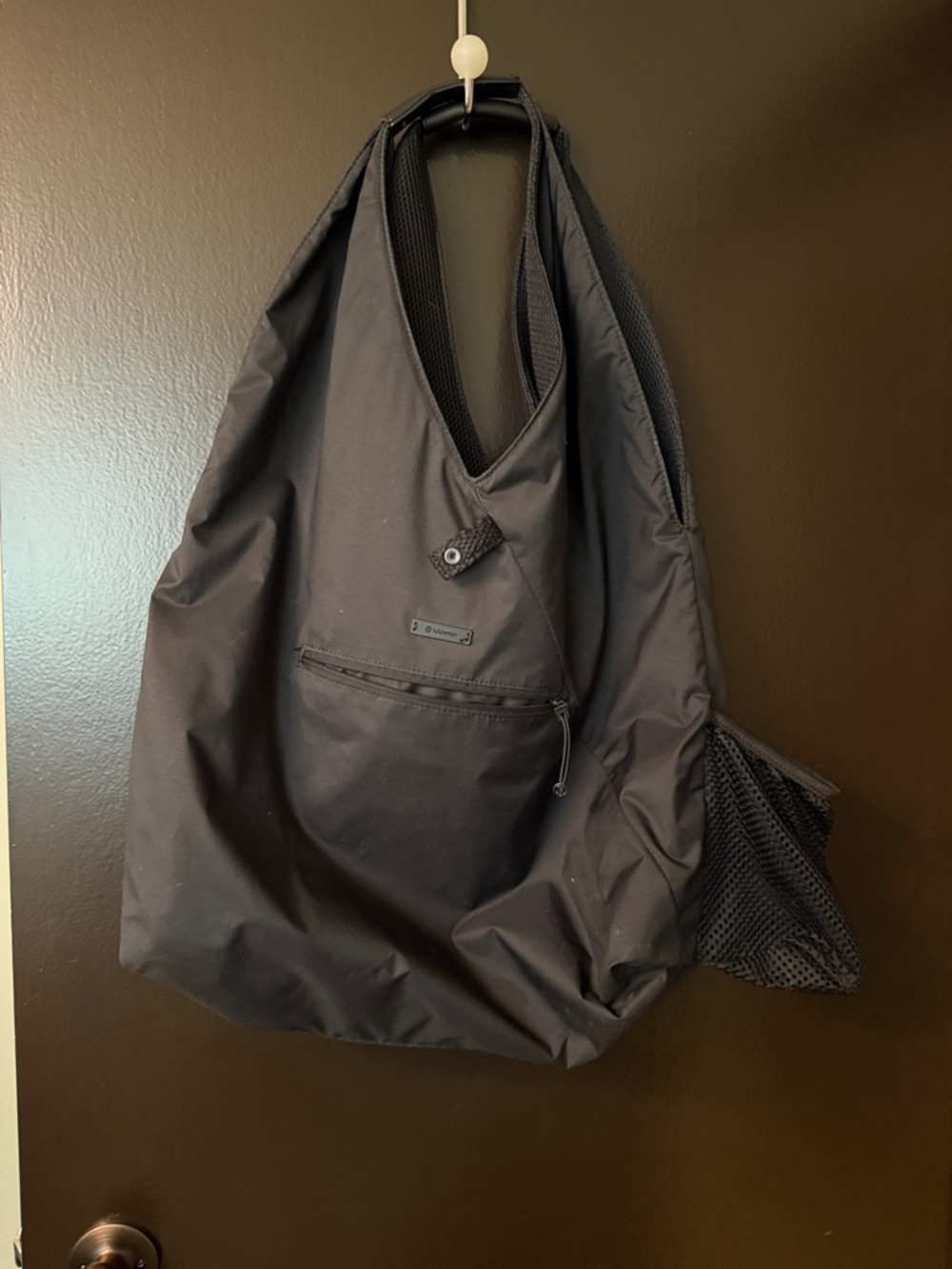 lululemon athletica Black Sling Tote with Mesh Pocket. This bag is reversible!!